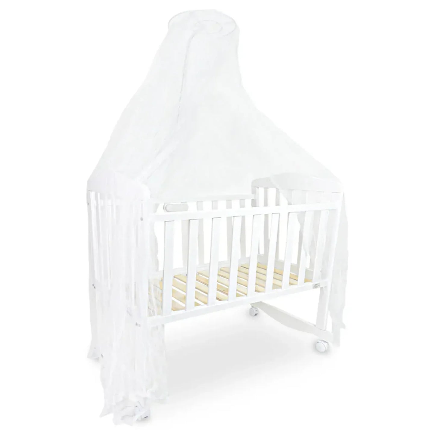 White crib with white mattress on a white background