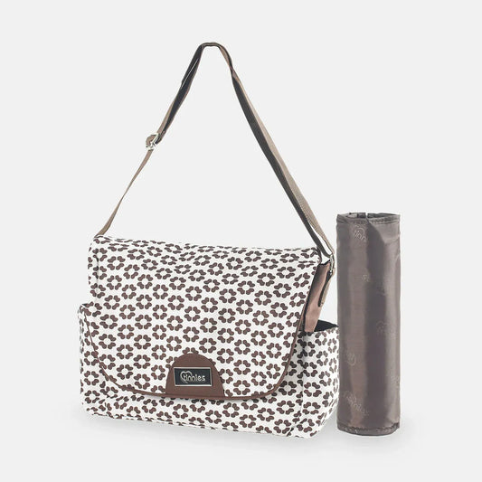 Floral-patterned bag with a matching mat on a white background