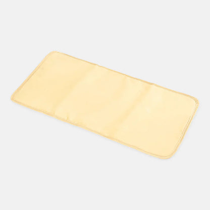 Yellow bath mat on a light gray background