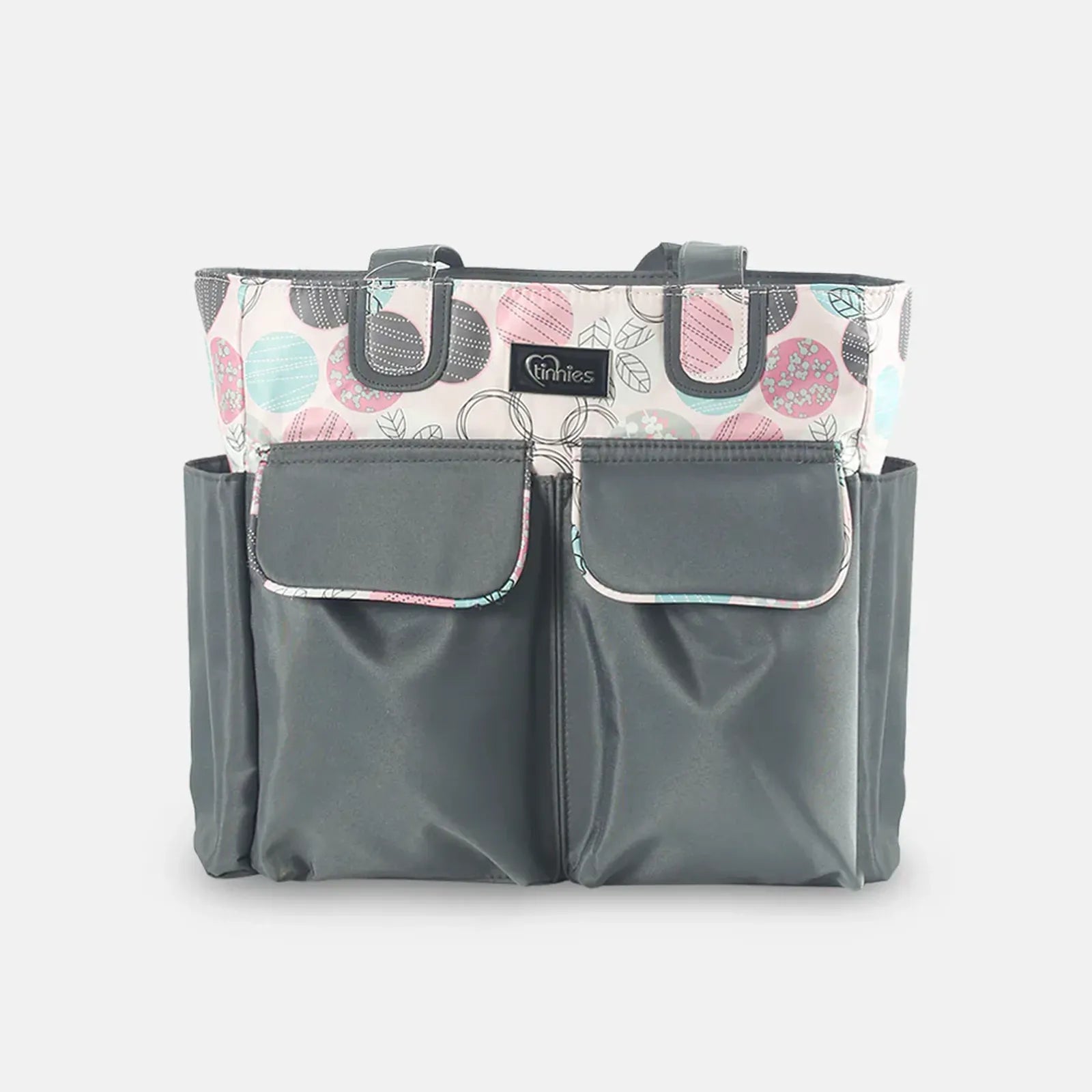 Gray diaper bag with floral patterned top section on a white background