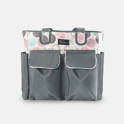 Gray diaper bag with floral patterned top section on a white background