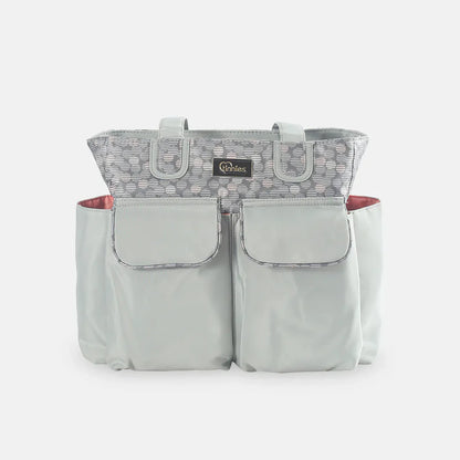 Gray diaper bag with a patterned top section on a white background