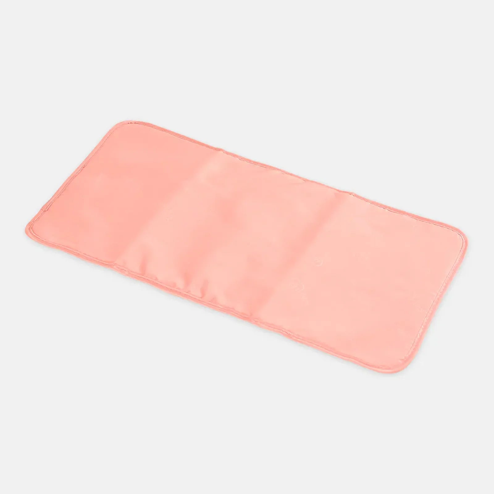 Peach-colored rectangular mat on a light gray background