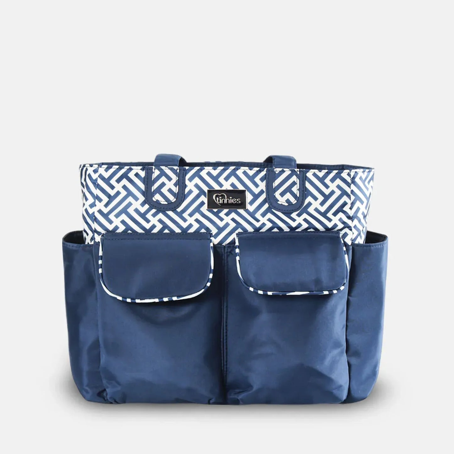 Blue and white patterned tote bag with a visible brand label on a light gray background