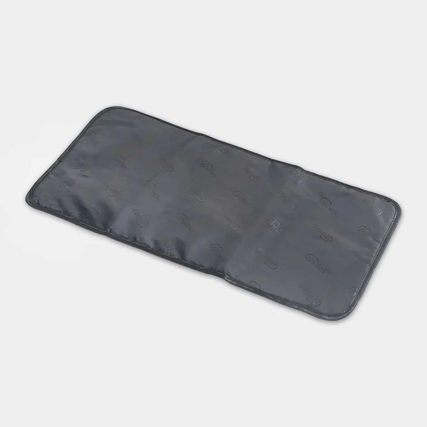 Black rectangular heating pad on a light gray background