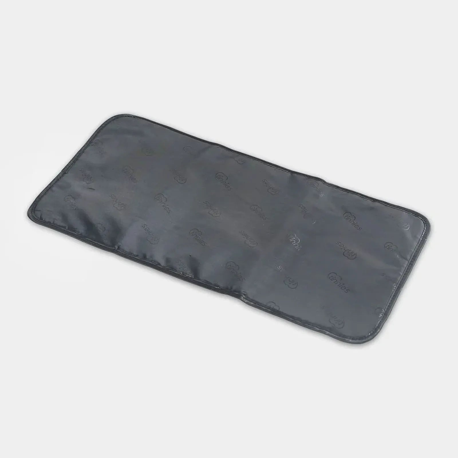 Black rectangular heating pad on a light gray background