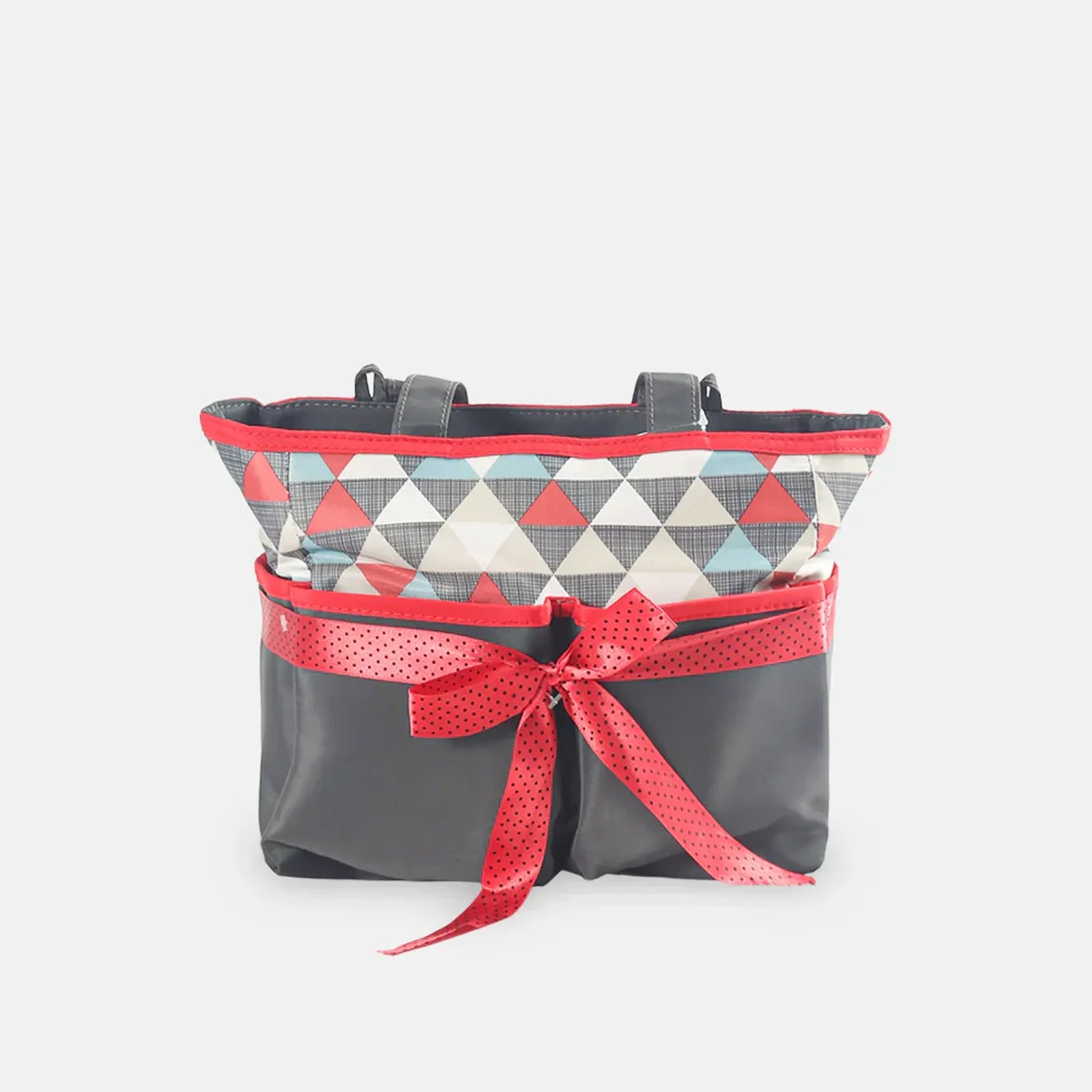 Gray bag with a red geometric patterned top section and a red ribbon on a white background