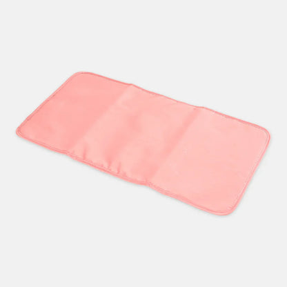 Pink bath mat on a light gray background