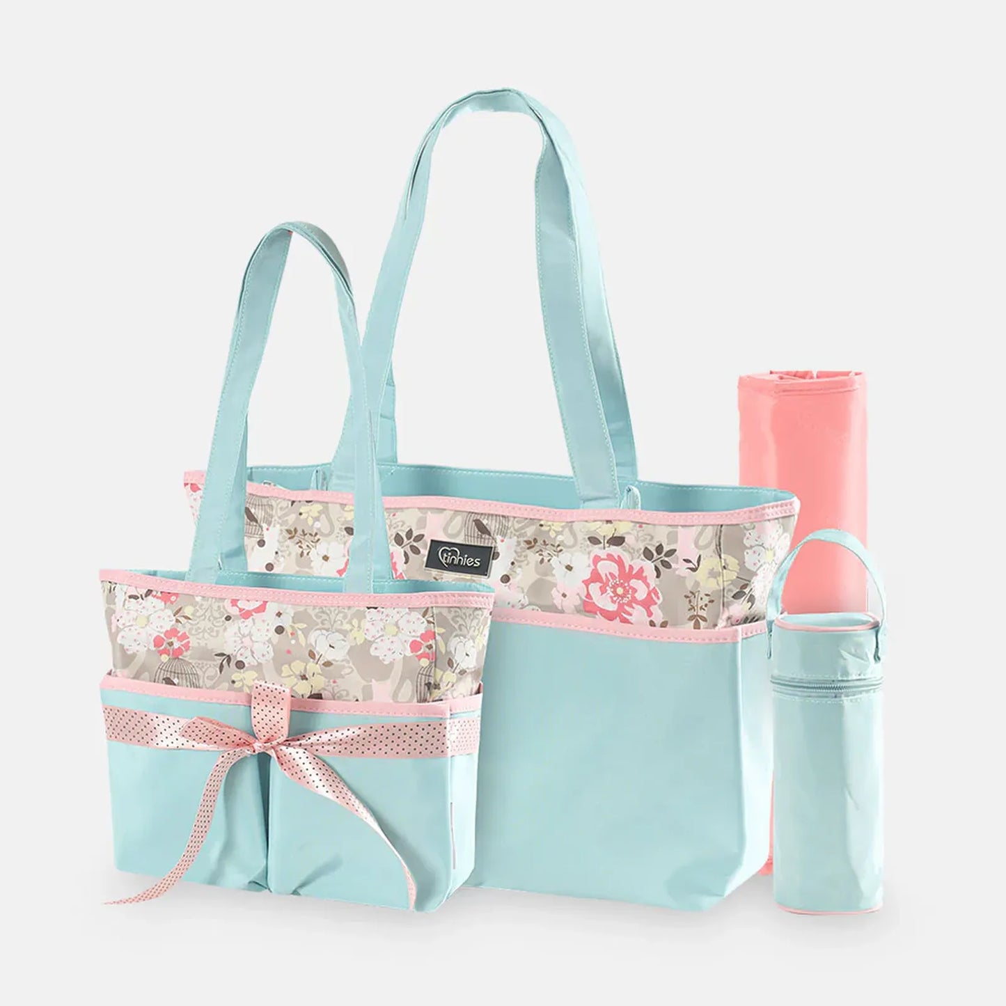 Floral-patterned tote bag with matching water bottle and sippy cup on a white background
