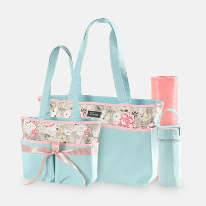 Floral-patterned tote bag with matching water bottle and sippy cup on a white background