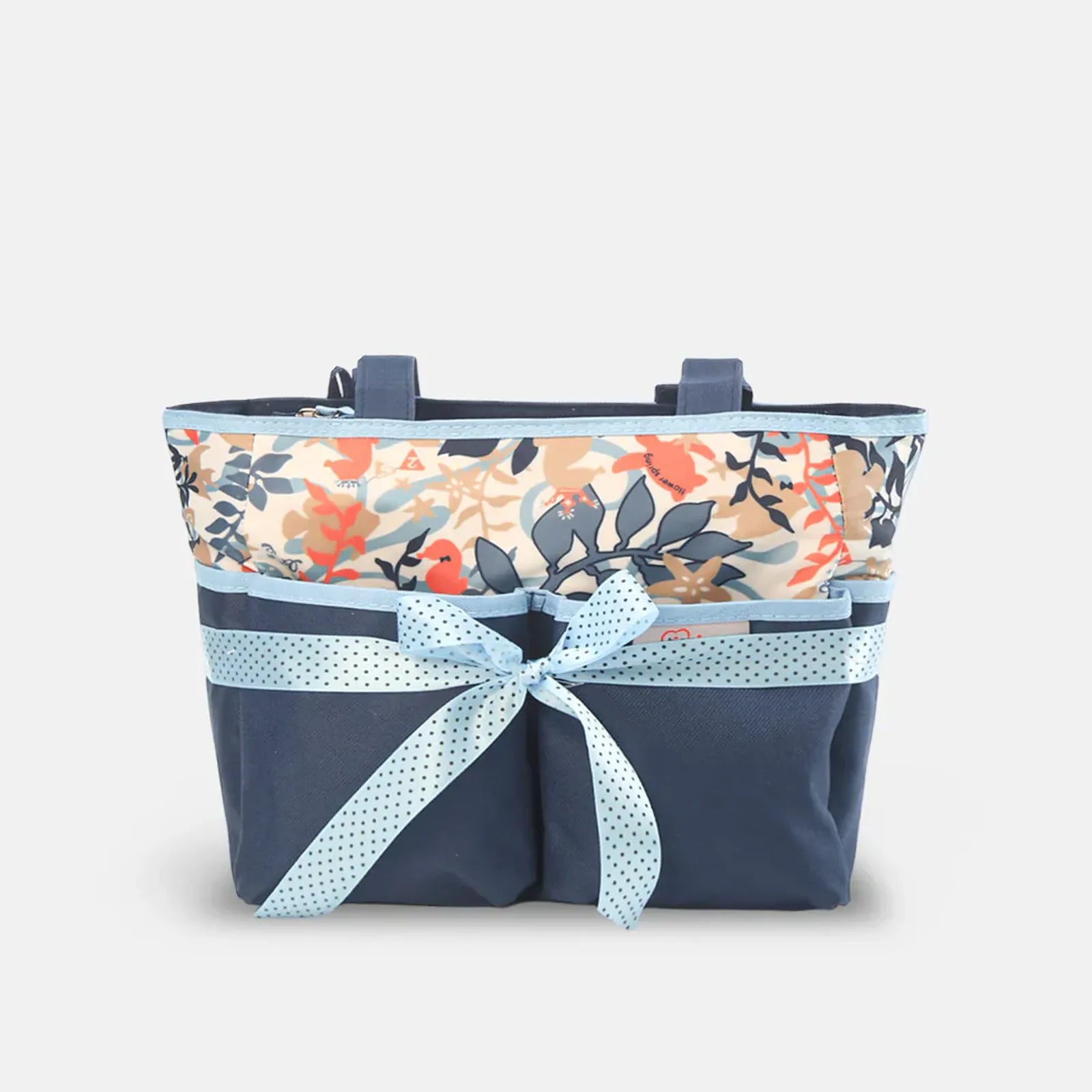 Floral-patterned bag with a navy base and light blue ribbon on a white background
