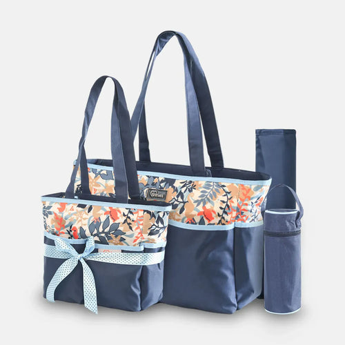 Navy blue tote bag with floral pattern and matching pouch on a light gray background