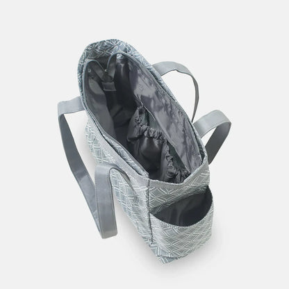 Gray patterned tote bag with a black interior on a white background