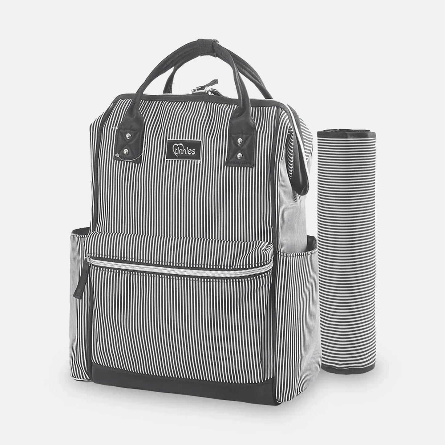 Black and white striped diaper bag with a matching changing pad on a light gray background