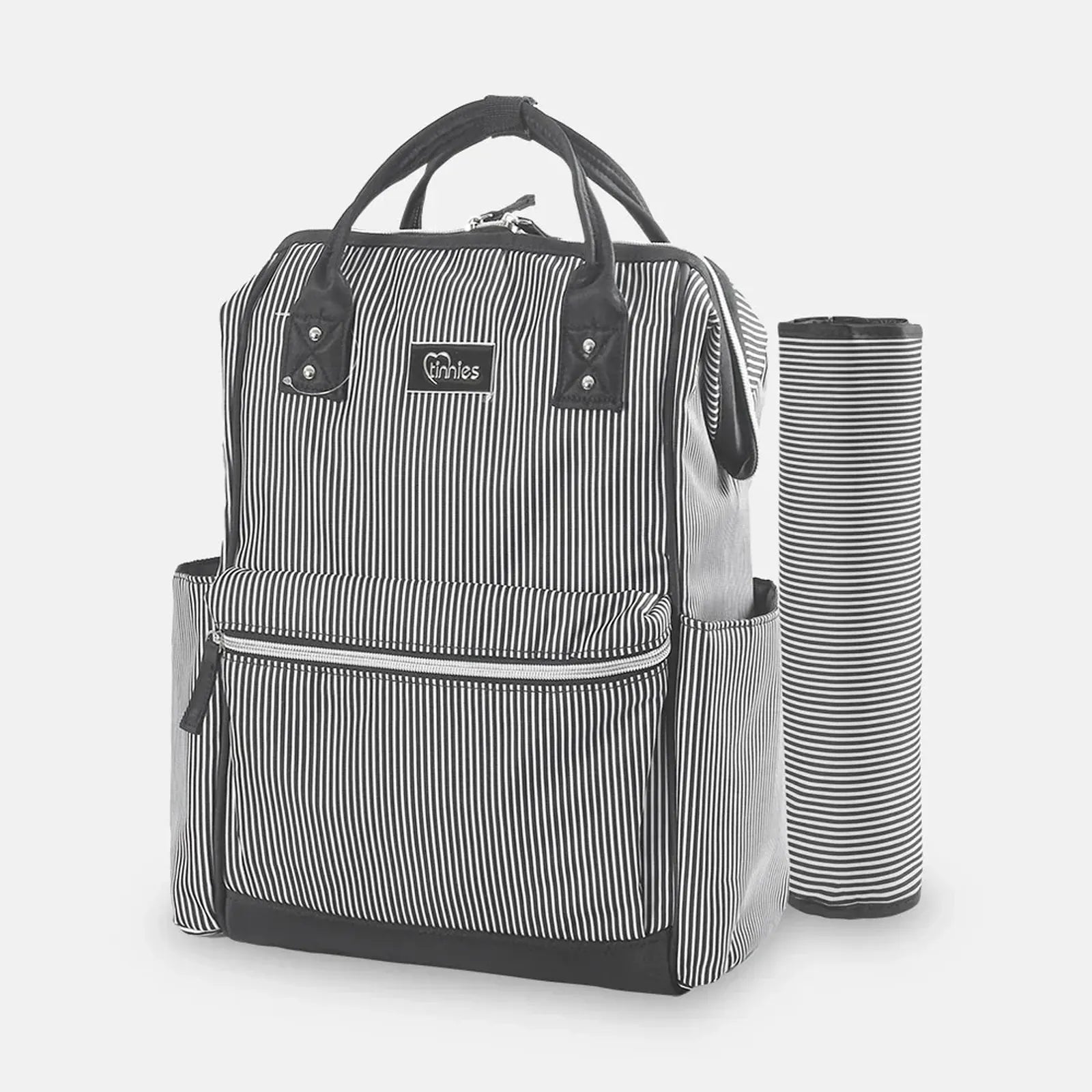 Black and white striped diaper bag with a matching changing pad on a light gray background