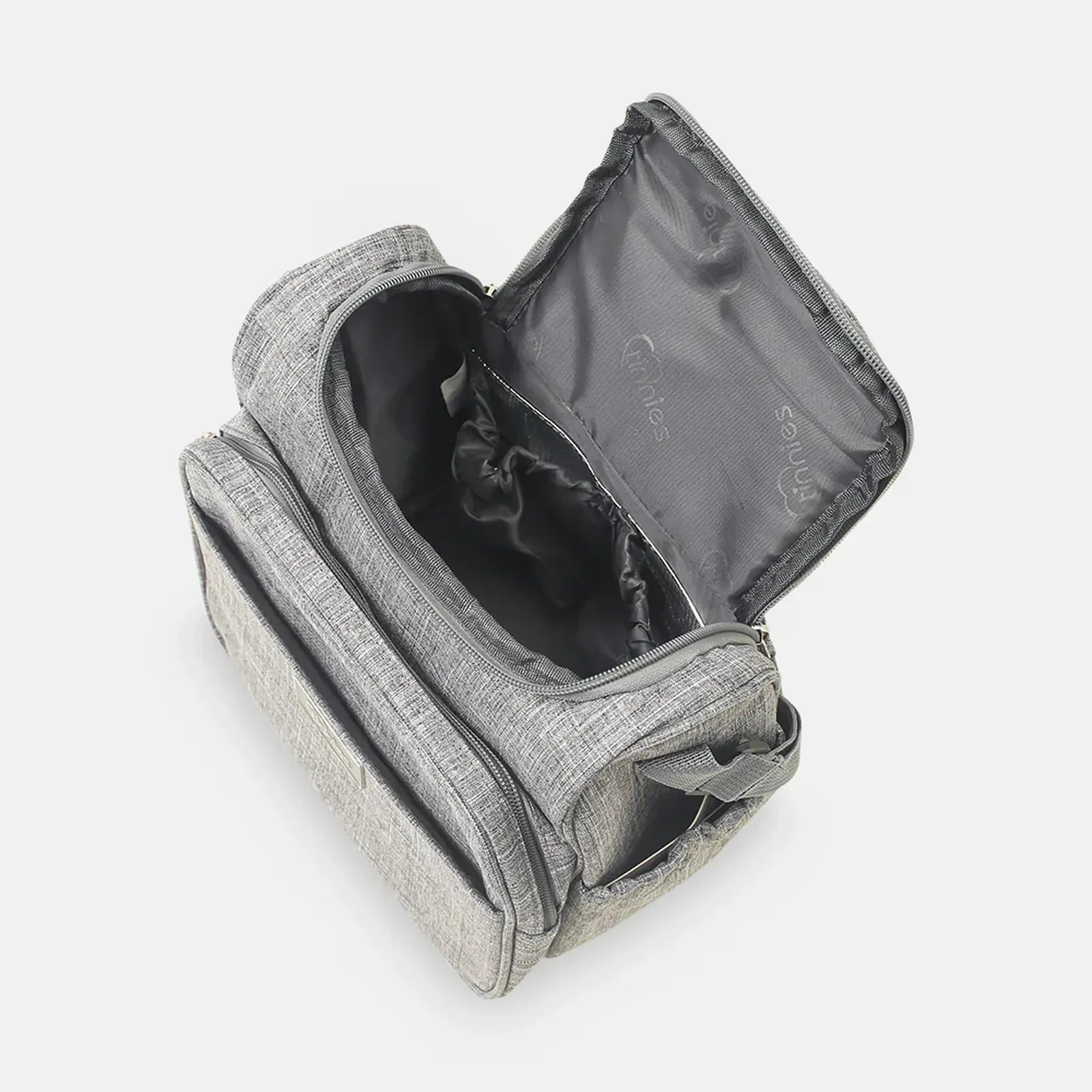 Gray toiletry bag with open lid on a white background