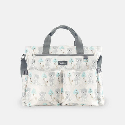 Patterned diaper bag with teddy bear design on a white background