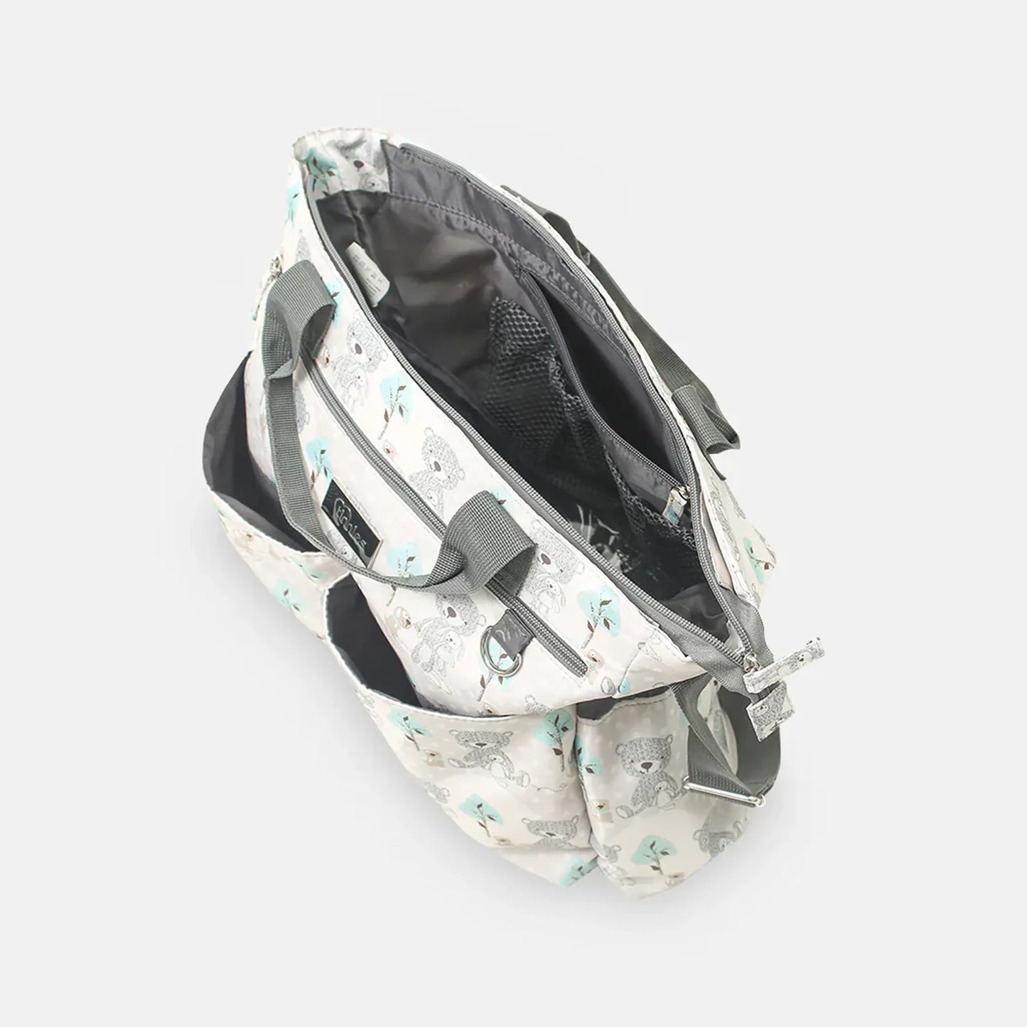 Baby carrier with teddy bear pattern on a white background