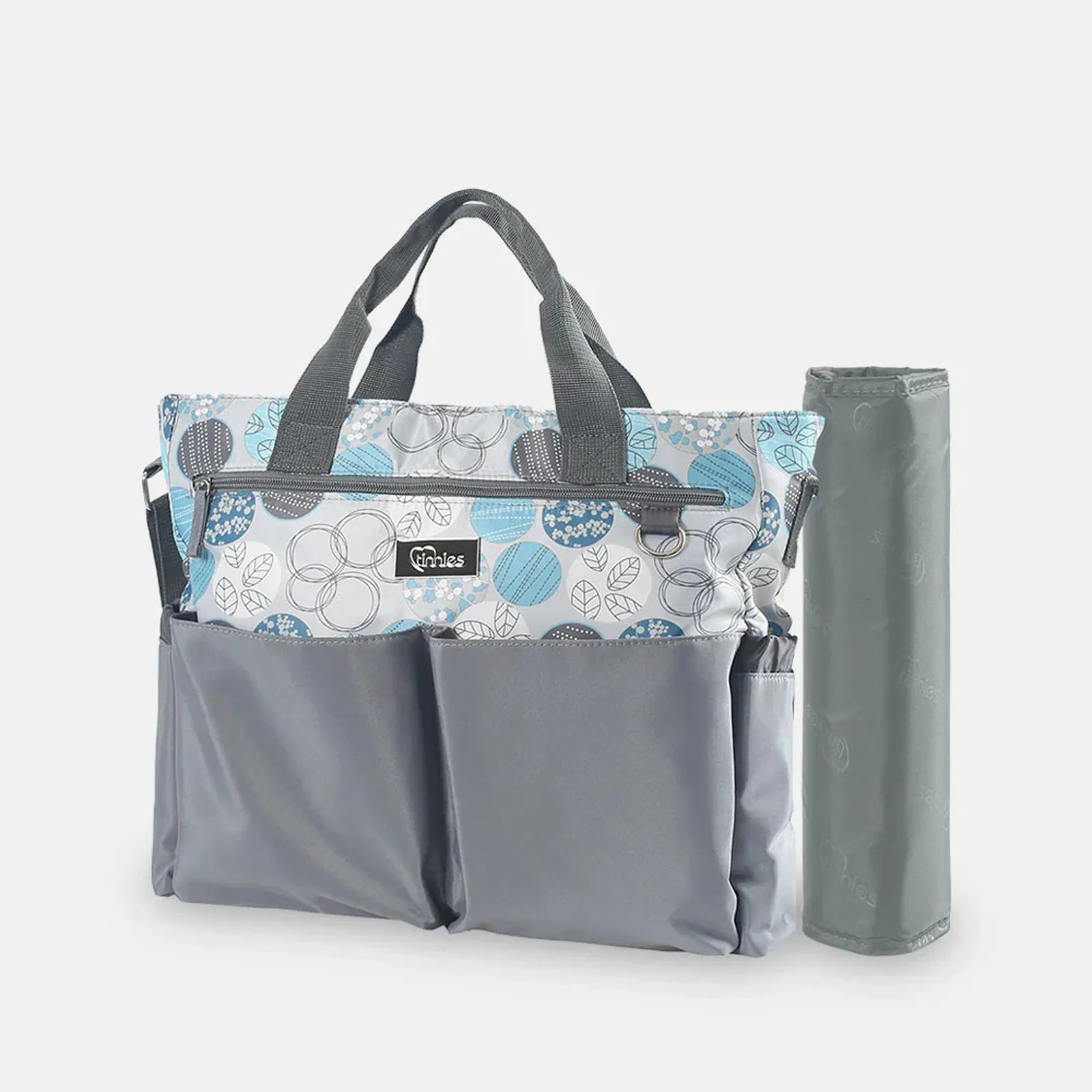 Gray tote bag with floral patterned side pocket on a white background