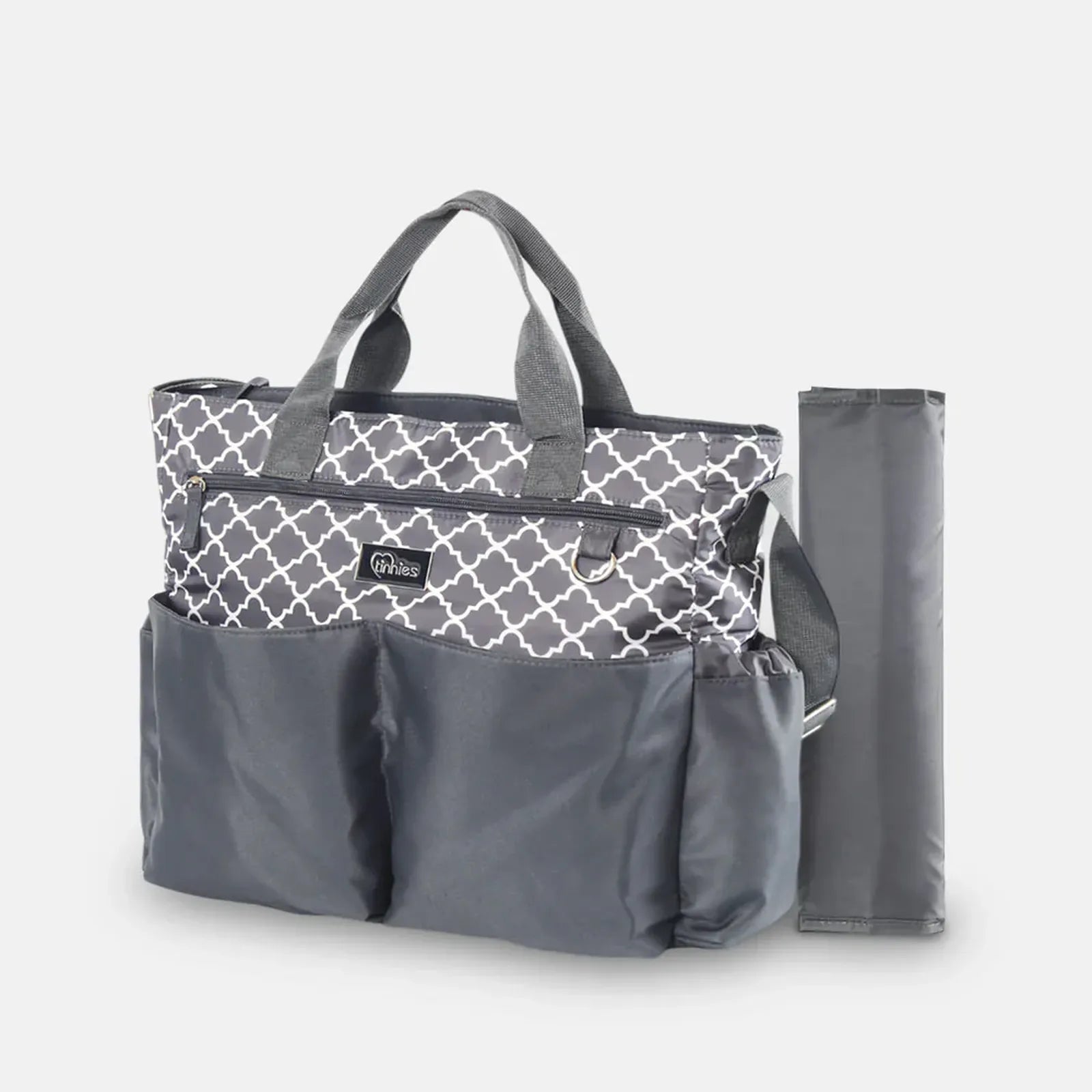 Gray and patterned diaper bag with a separate pouch on a light gray background