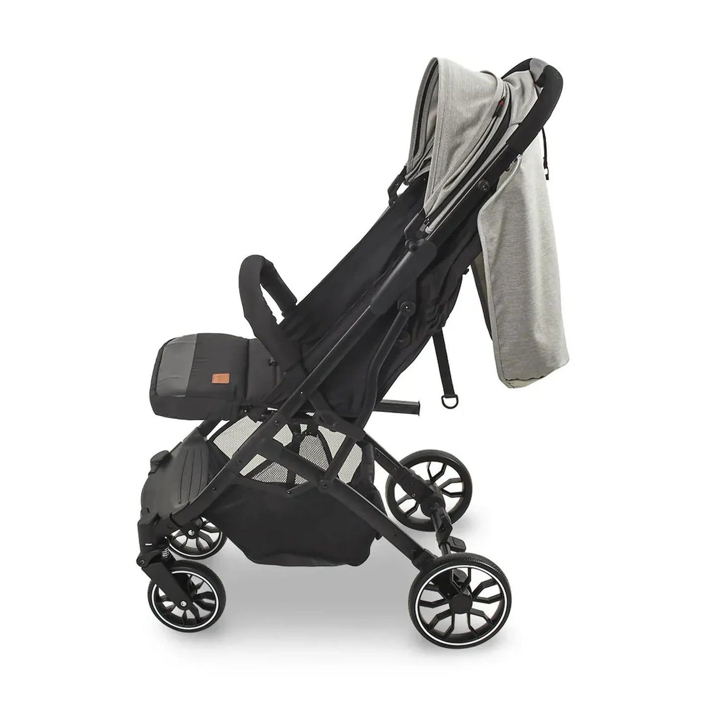 Black stroller with a gray cover on a white background