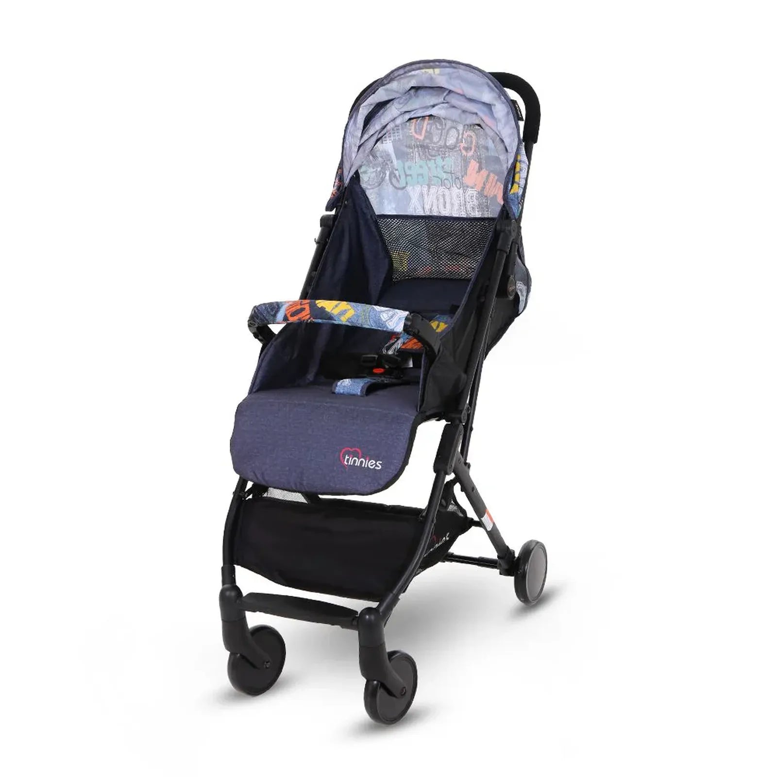 Baby stroller with colorful patterned seat on a white background