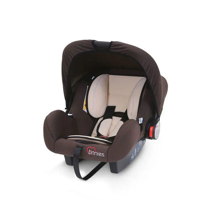 Brown and beige baby car seat with 'tinny' branding on a white background