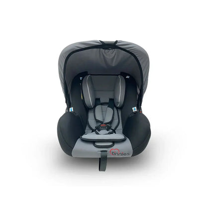 Gray and black car seat with visible brand logo on a white background