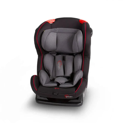 Gray and black car seat with red accents on a white background