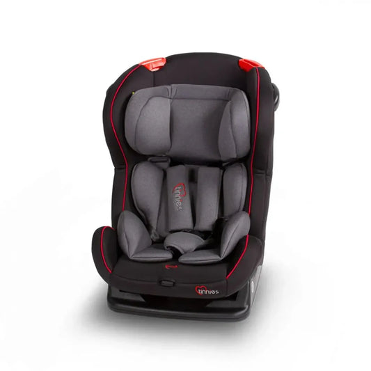 Gray and black car seat with red accents on a white background