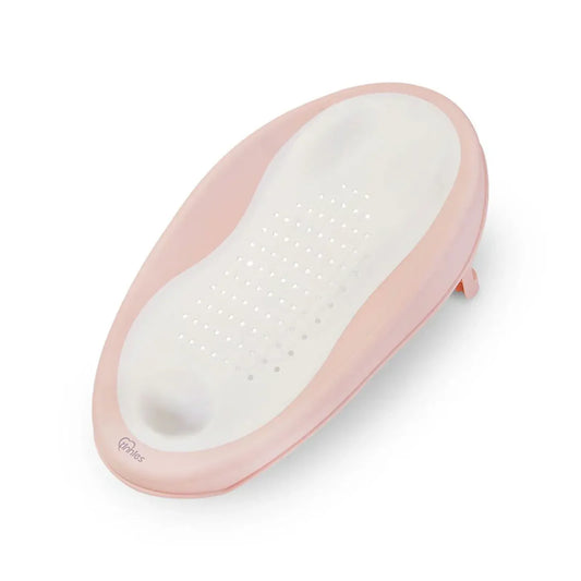 Baby bath support with pink rim and white interior on a white background
