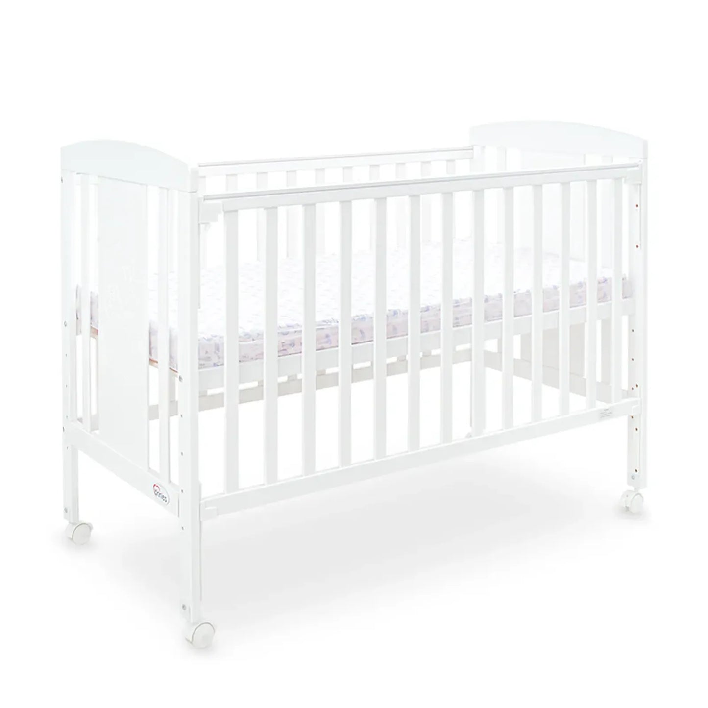 White crib with a mattress on a white background