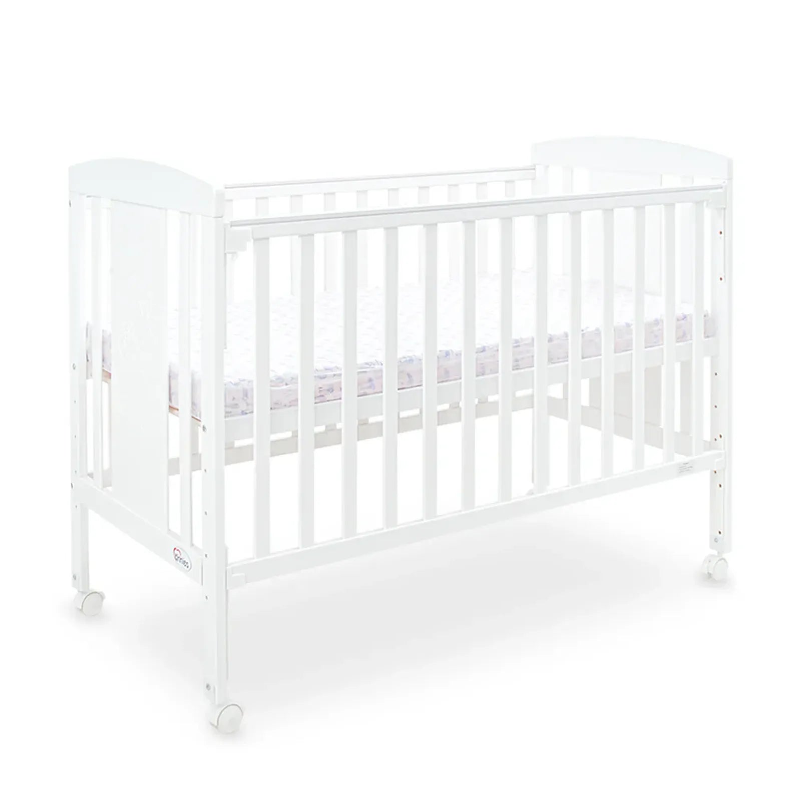 White crib with a mattress on a white background