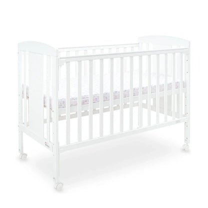 White crib with a mattress on a white background
