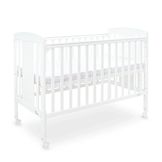 White crib with a mattress on a white background