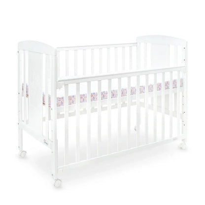 White crib with pink and purple bedding on a white background
