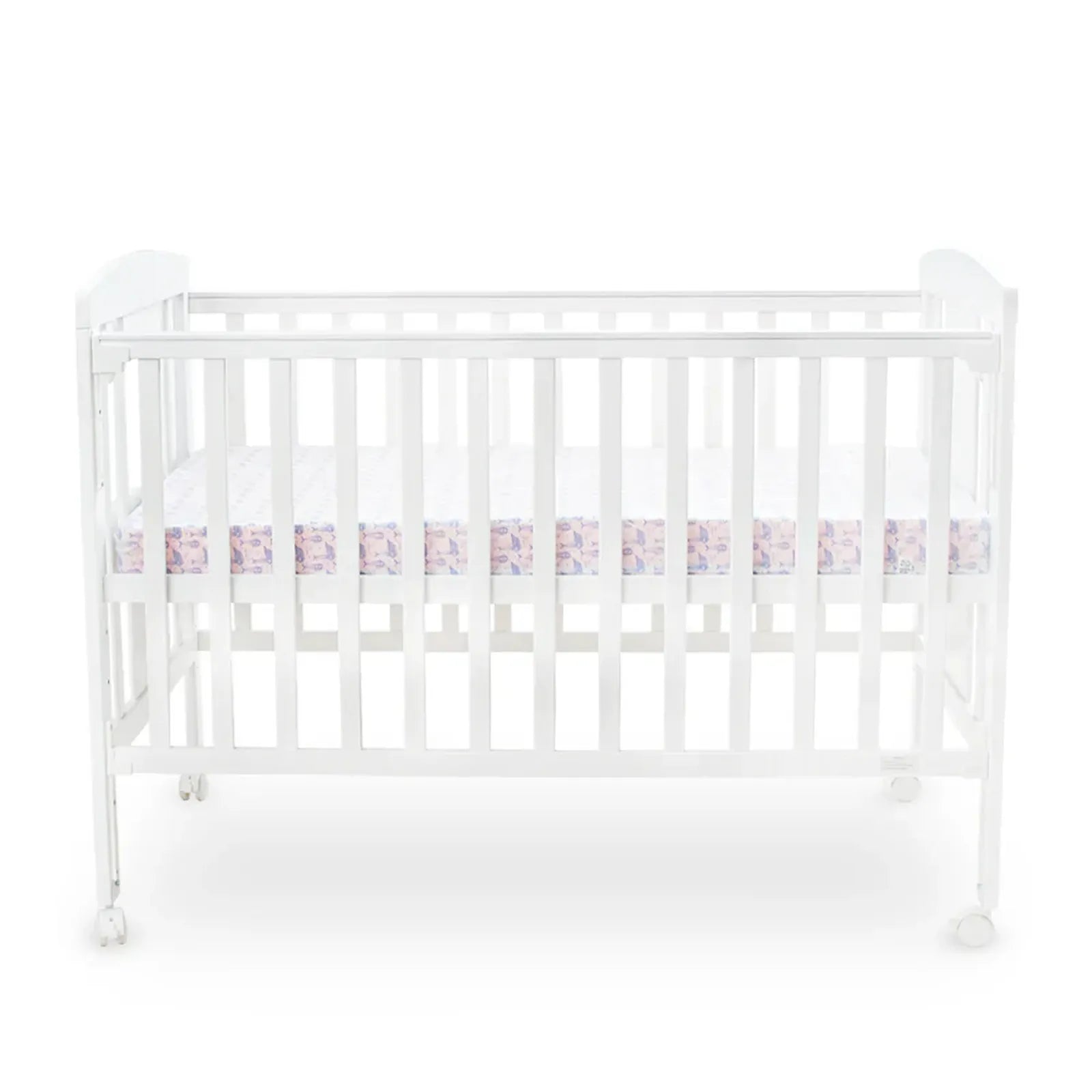 White crib with a pink and white checkered bumper pad on a white background