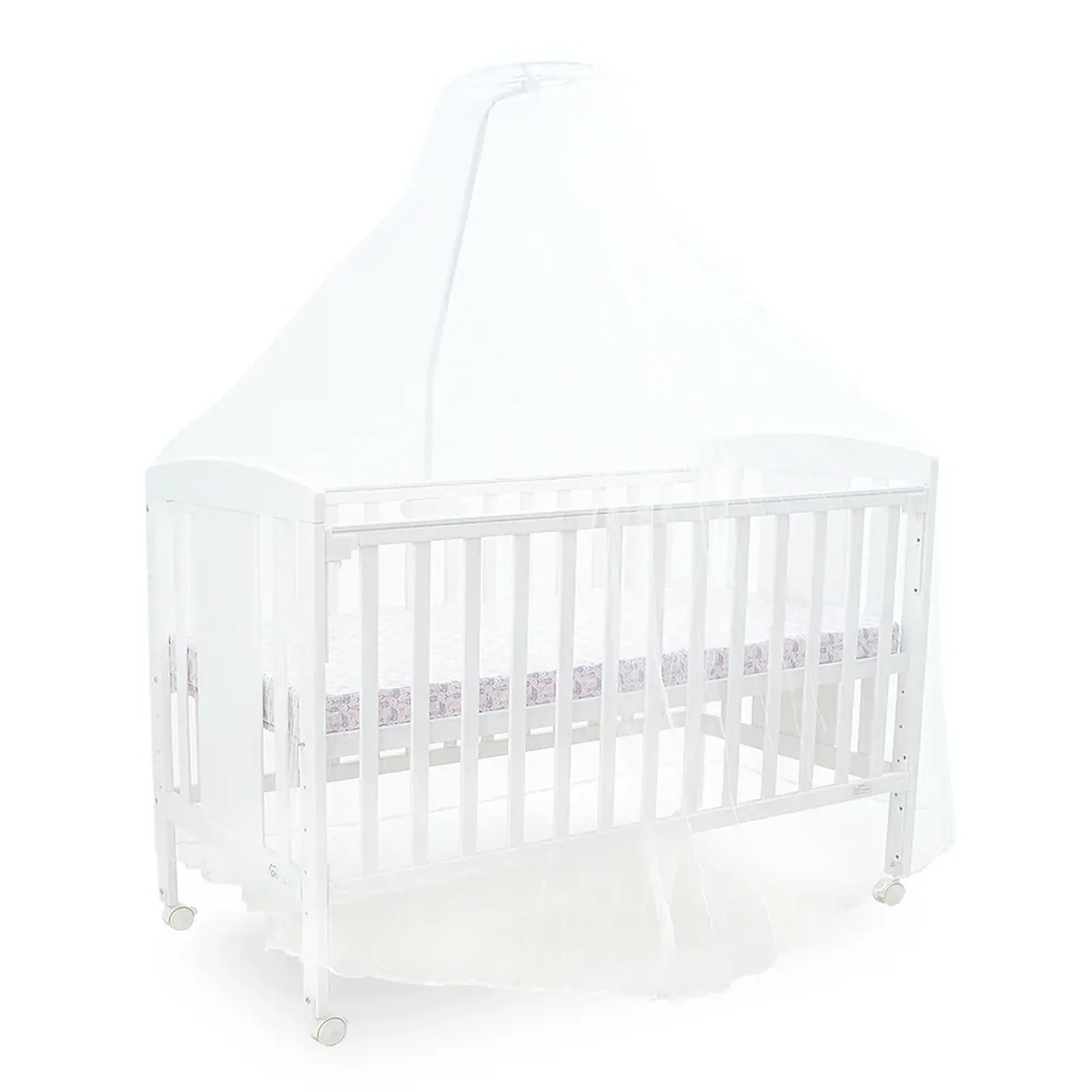 White crib with a white mattress on a white background