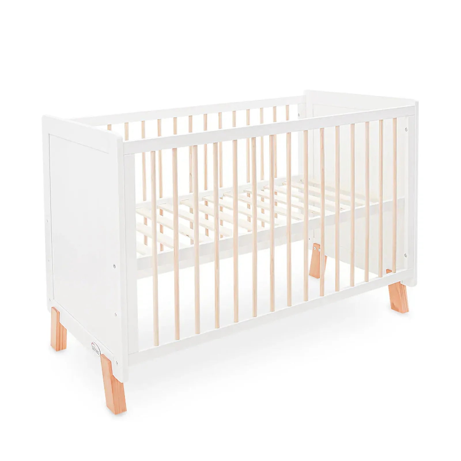 White crib with wooden accents on a white background