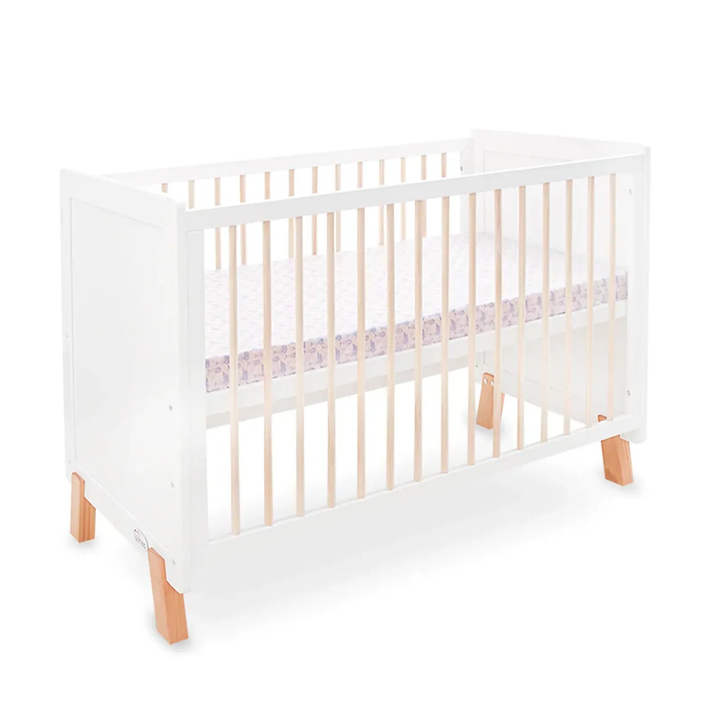 White crib with wooden legs on a white background