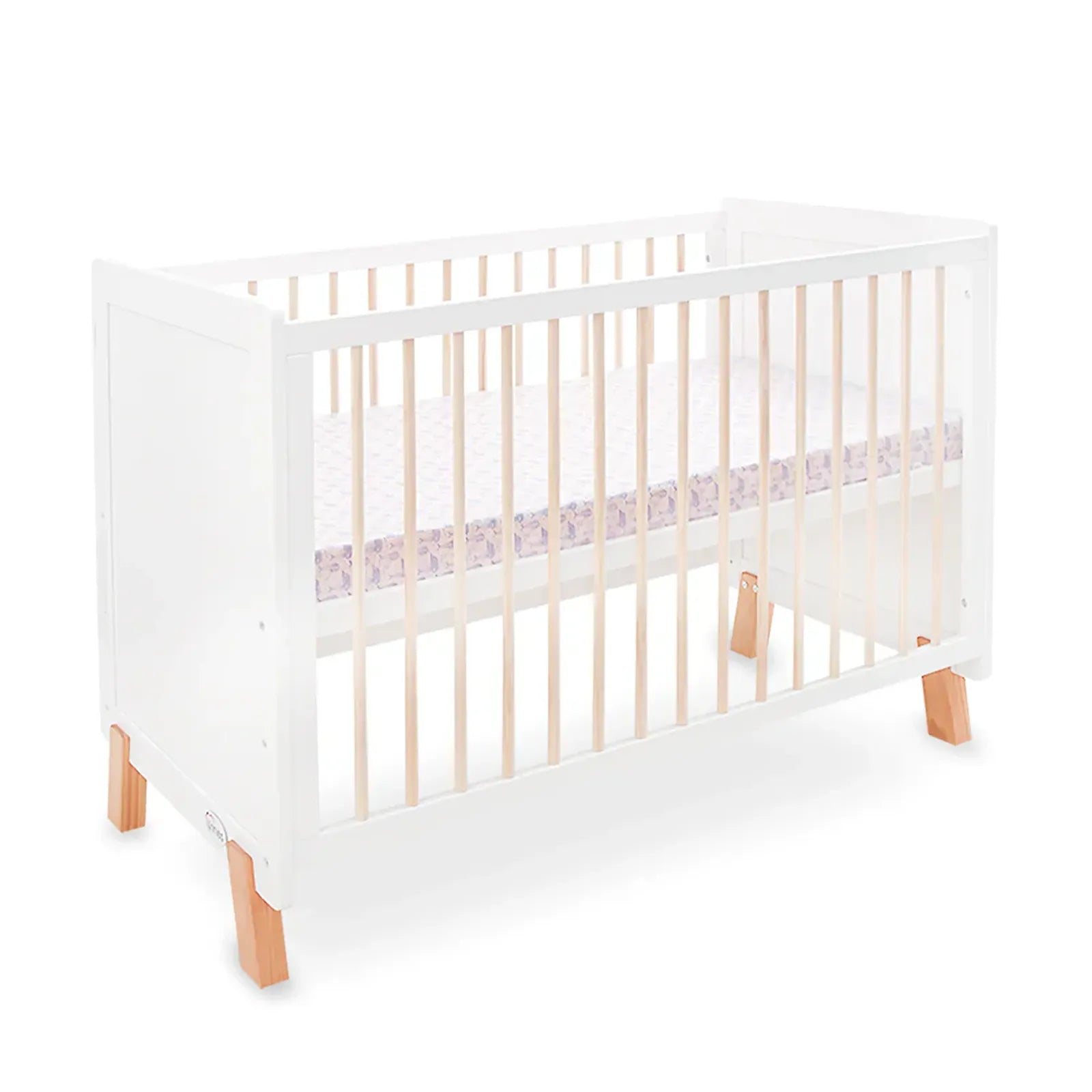 White crib with wooden legs on a white background