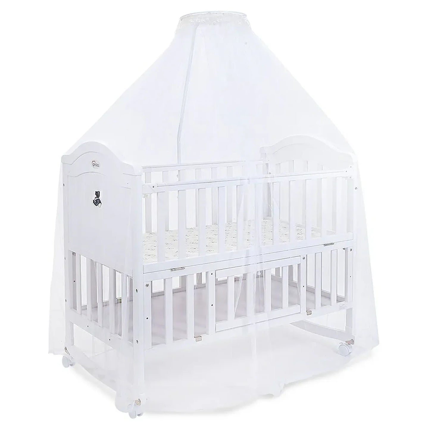 White crib with canopy on a white background
