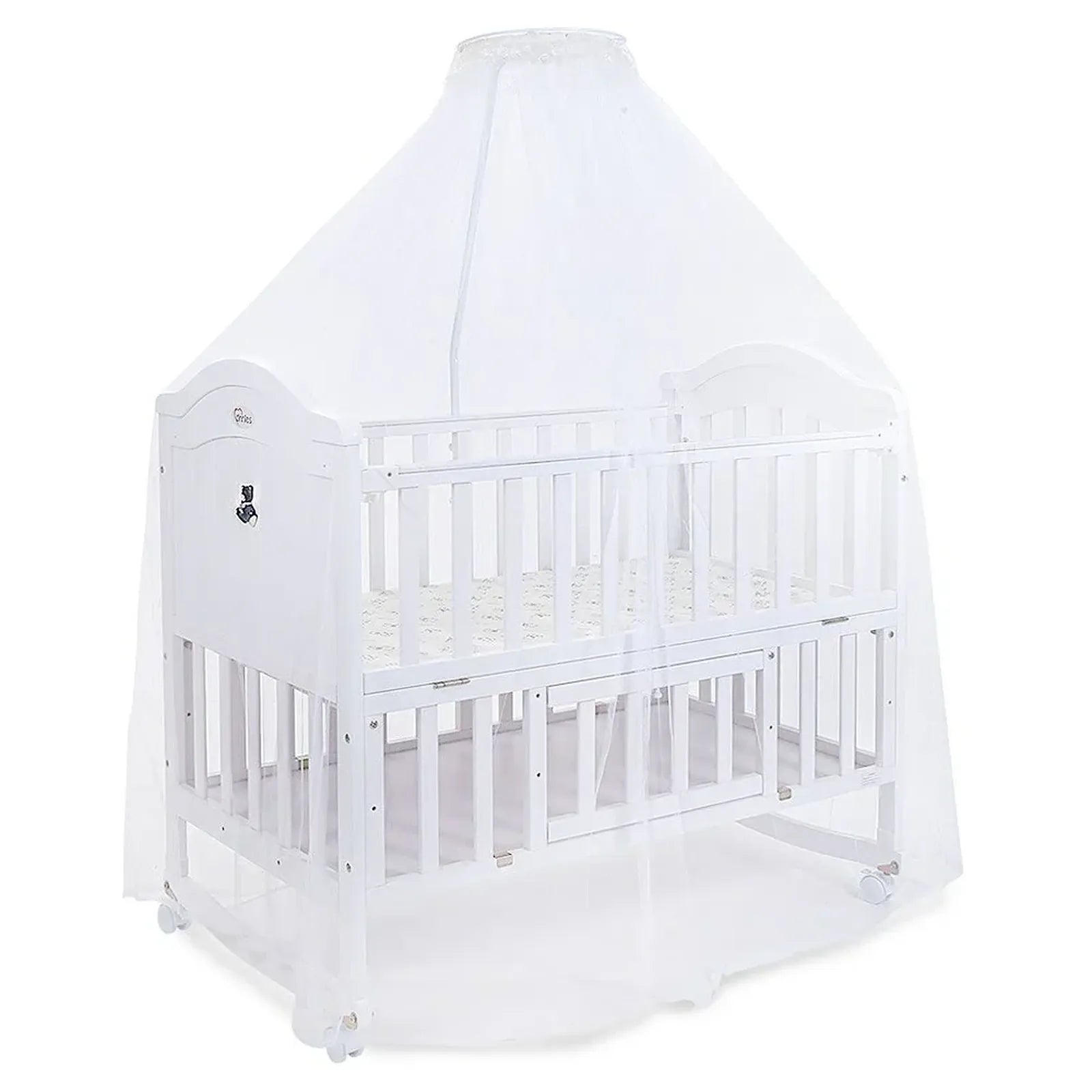 White crib with canopy on a white background