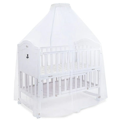 White crib with canopy on a white background