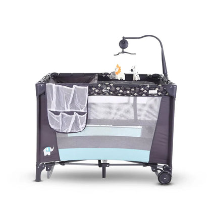 Baby playpen with toys and a hanging toy on a white background