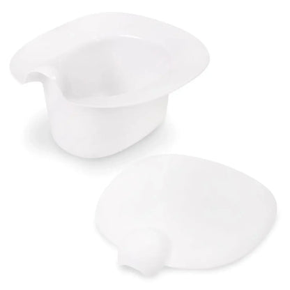 White ceramic pitcher on a white background