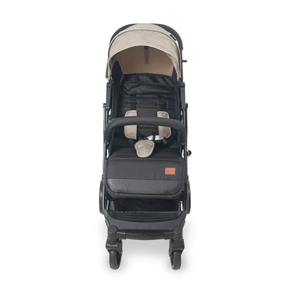 Black stroller with beige accents on a white background