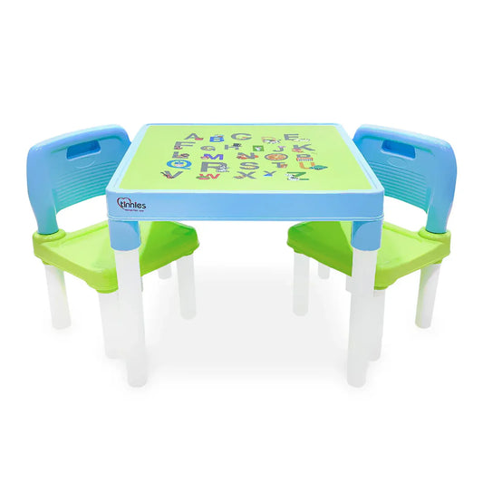 Children's table and chairs set with alphabet design on a white background