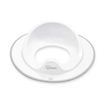 White baby bowl and plate set on a white background with 'Ninnes' branding.